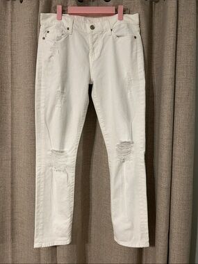 7 For All Mankind White Slim Straight Distressed Jeans.